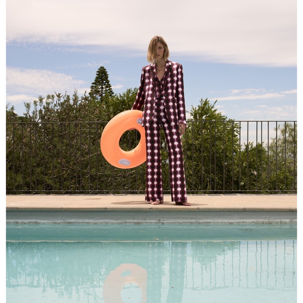 PRINTED FLARED PANTS